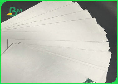 stack authority grocery store 43 cm x 61 cm 45 g / m2 48 g / m2 50 g / m2 Biały papier gazetowy w arkuszu  na papier do wiadomości